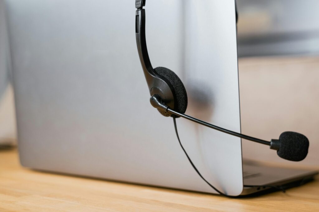 Virtual Bookkeeping Services - Laptop With Headset Ready For Action
