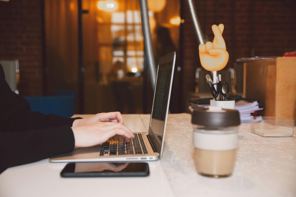 Virtual Bookkeeping Services - Virtual Assistant At Desk With A Laptop