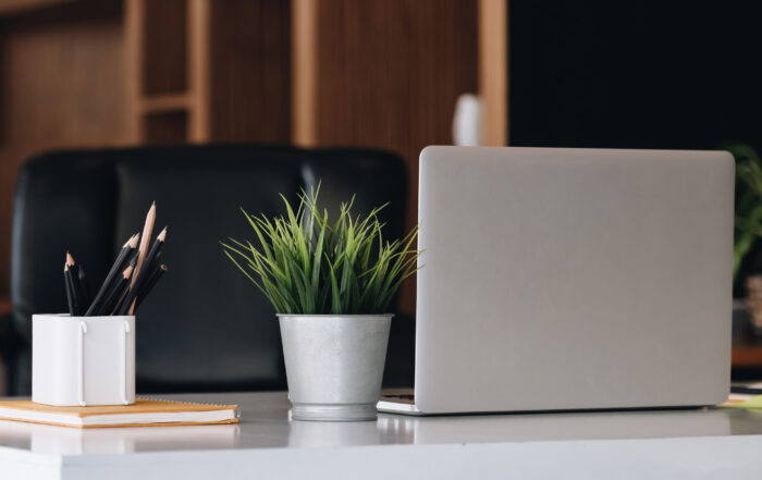 Virtual Assistant for Startups - Desk with laptop and modern furniture